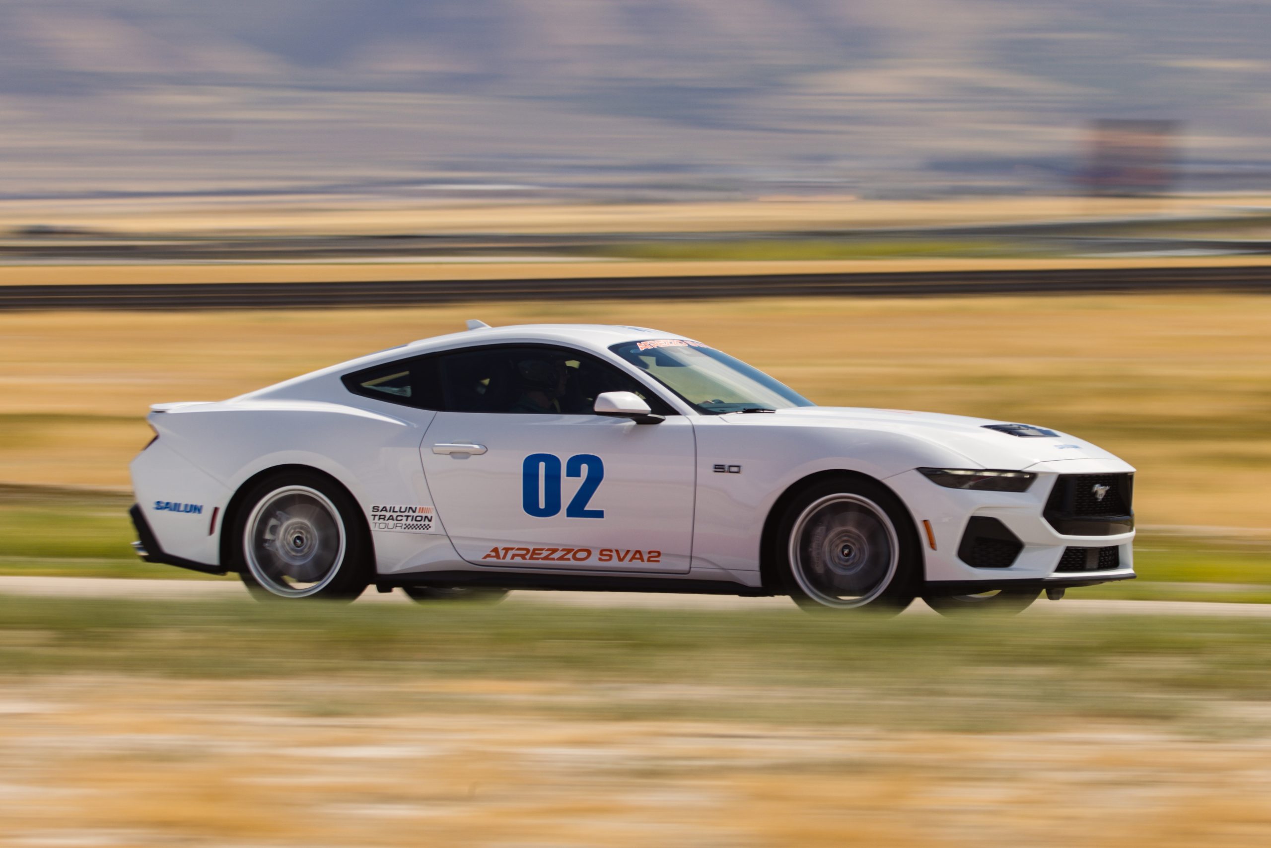 Sailun Atrezzo SVA2 tire on test vehicle during on-track evaluation by AutoGuide at Utah Motorsports Campus in hot summer conditions (96 °F / 35 °C).